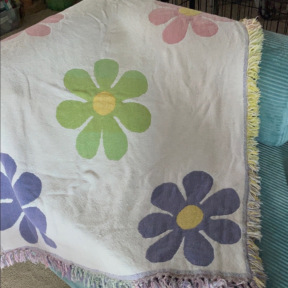 Woven cotton throw w/ fringe edges & flower power motif, approx  37” x 47”